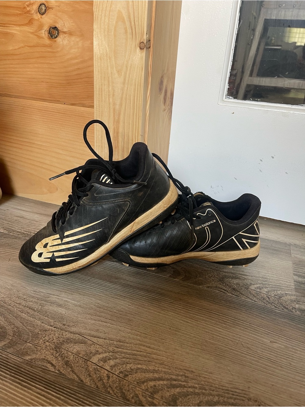 New Balance boys Black and Cream Athletic Shoes